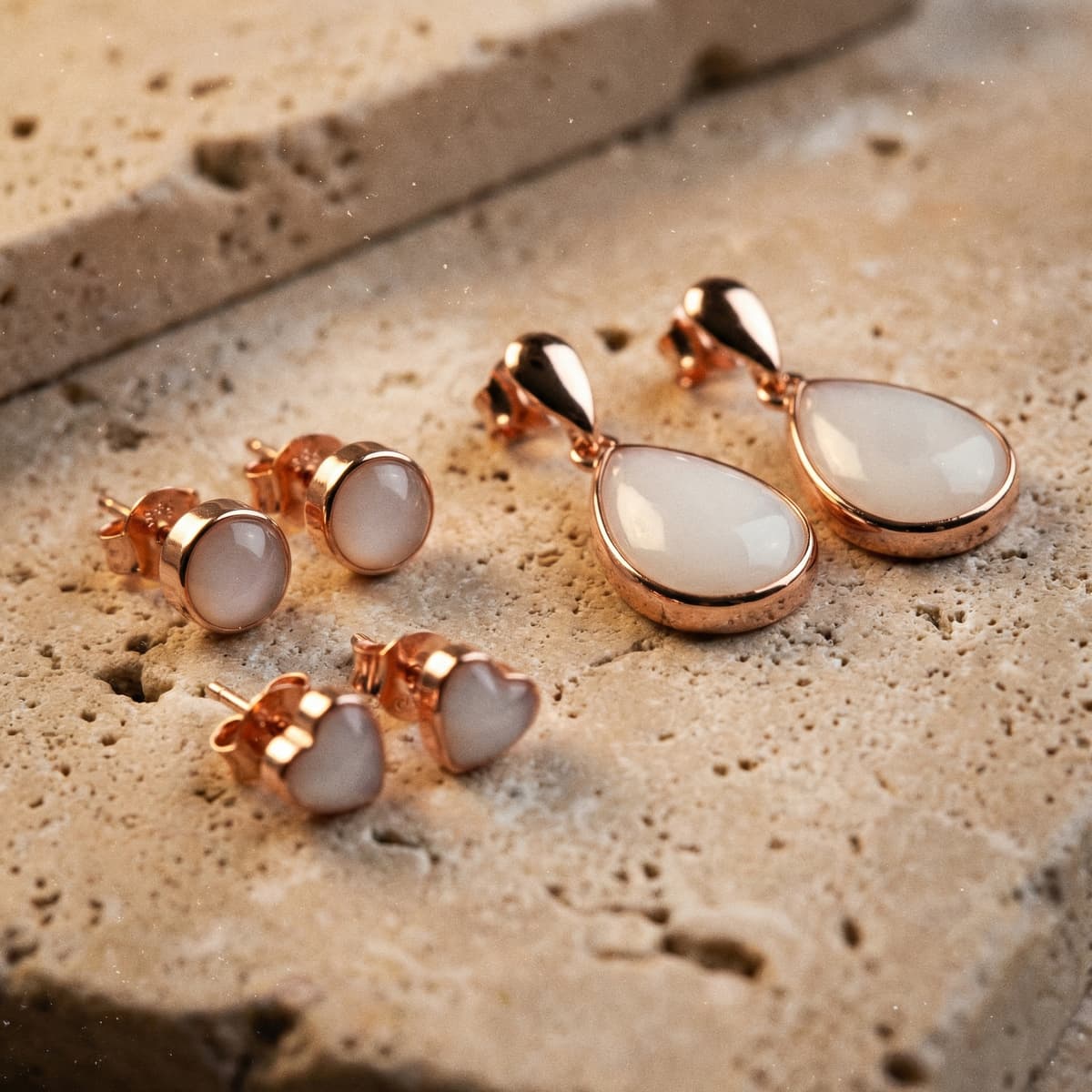 Rose gold and milky white resin jewelry set with teardrop and stud earrings, showcasing a breastmilk earrings diy kit keepsake style